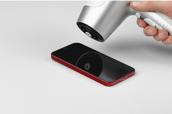 Heat the protective glass and lift one corner.