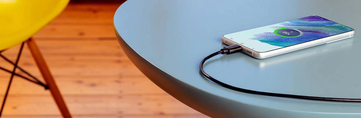 Mobile phone is on the table and is 80% charged.