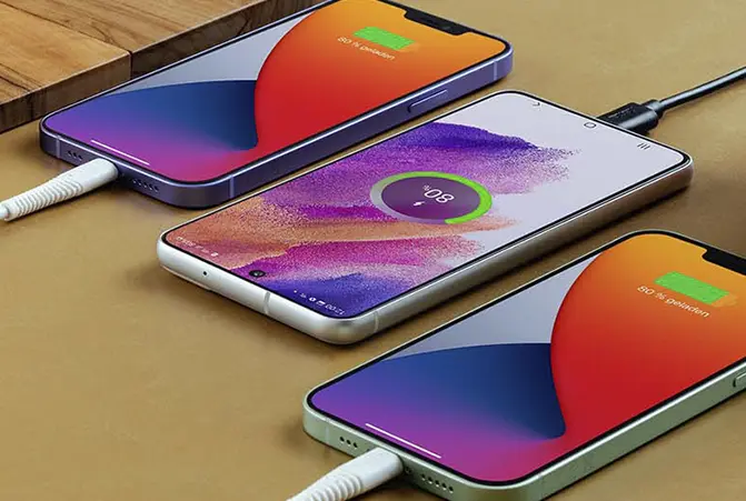 Several phones are on the table and are being charged.