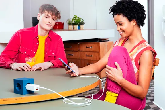 iPhone charges quickly with a Power Delivery charger.