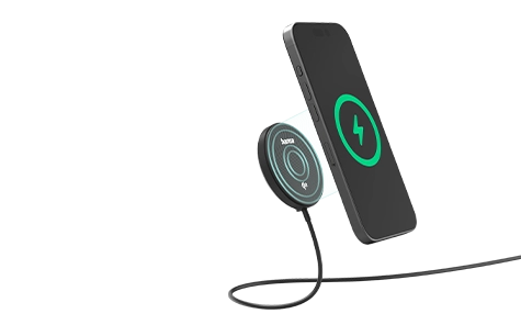 A smartphone is charged wirelessly with a Hama charger