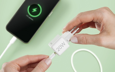 A smartphone is charged with the 20 watt super mini charger