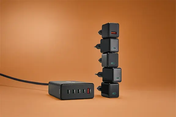 Several devices next to the charger.