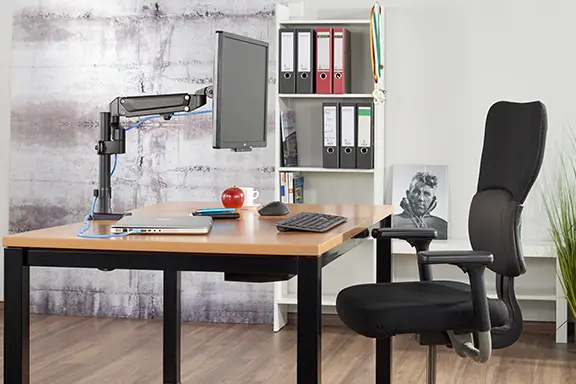 Desk with laptop and screen holder